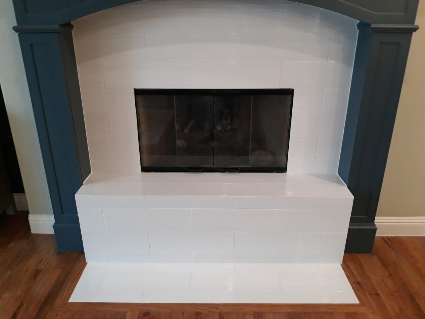 Tiled Fireplace Surround & Hearth by Masterpiece Tile and Grout in the DFW area